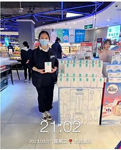 Beauty advisor serving a customer in store